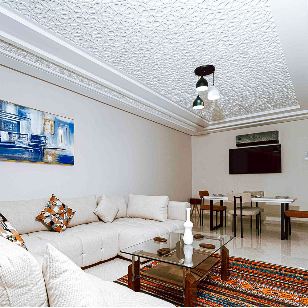 Elegant dining area with Moroccan architectural details and modern lighting – Golden Sky Home Béni Mellal